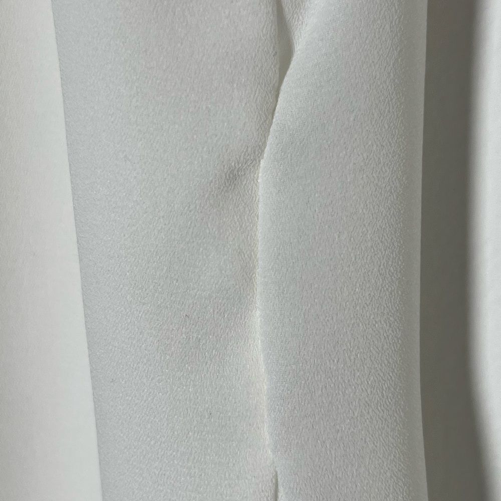 Alexis White Tie Neck Ruffle Sleeveless Blouse - Picture 6 of 8
